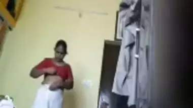 Tamil maid changing dress in her room captured using hidden cam