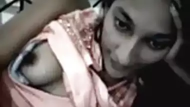 Webcam solo with an Indian chick flashing her tits