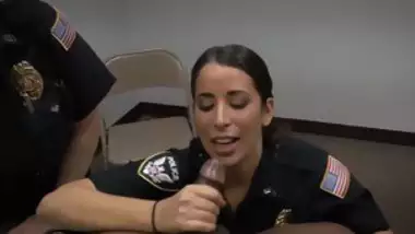 Two horny MILF cops suck his big black cock