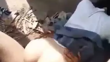 Indian school girl indulging in a secret outdoor sex