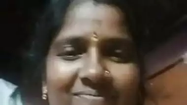 Tamil horny aunty showing her boobs with audio