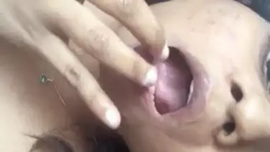 Indian girl tastes pussy juice while she masturbates her cunt