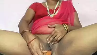 Hot south indian wife inserting carrot into her pussy