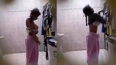 Desi girl with big boob dress change shot secretly by friend.