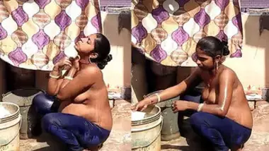 desi aunty bathing outside