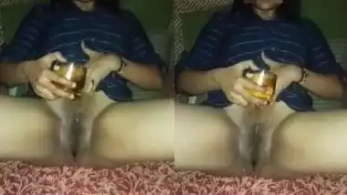 bhabhi pouring whisky on her wet pussy