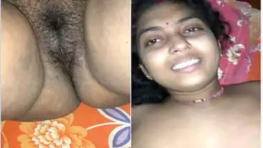 Desi lies on her back but sex partner touches her XXX breasts on camera