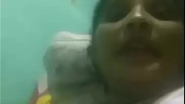 Indian aunty showing shaved wet pussy on phone