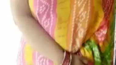 Woman in a colored dress teases Desi guys revealing big breast