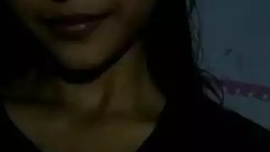 Indian films herself smiling and exposing nice boobs and dark nipples