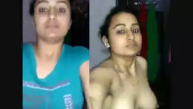 Sexy desi girl showing her boobs and fingering pussy